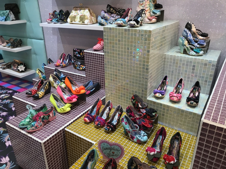 A crazy display at the Irregular Choice shoe store in London, England. Dozens of quirky high heels decorate tiled stair displays in the store.